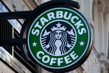 Tesla рекомендовала своим клиентам использовать для обновления карт кофейни Starbucks
