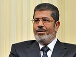 Экс-президента Египта Мурси будут судить за оскорбление судей и давлении на суд
